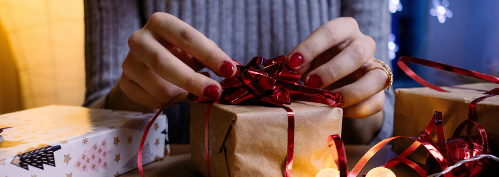 woman wrapping present