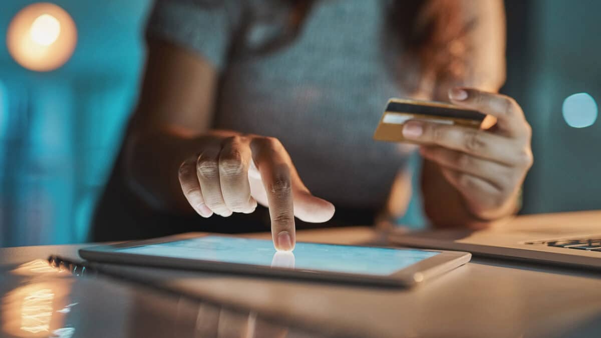 woman paying online with credit card