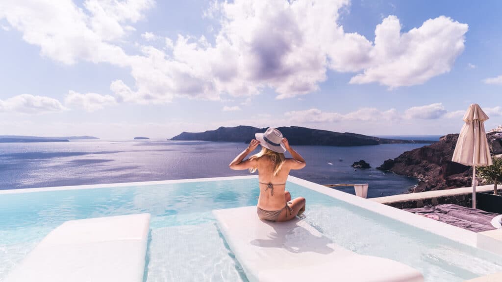 woman at pool on vacation