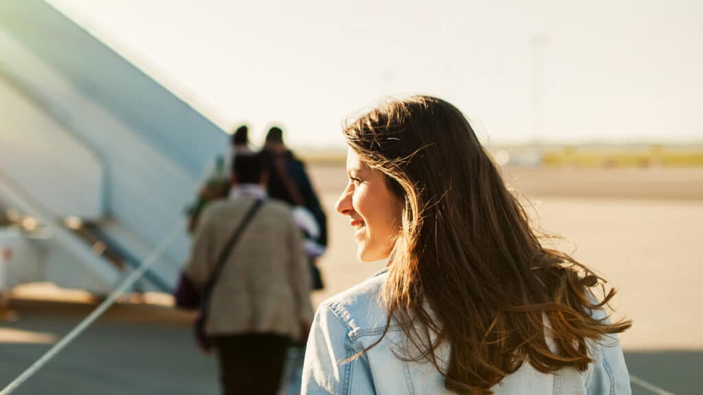 woman boarding plane