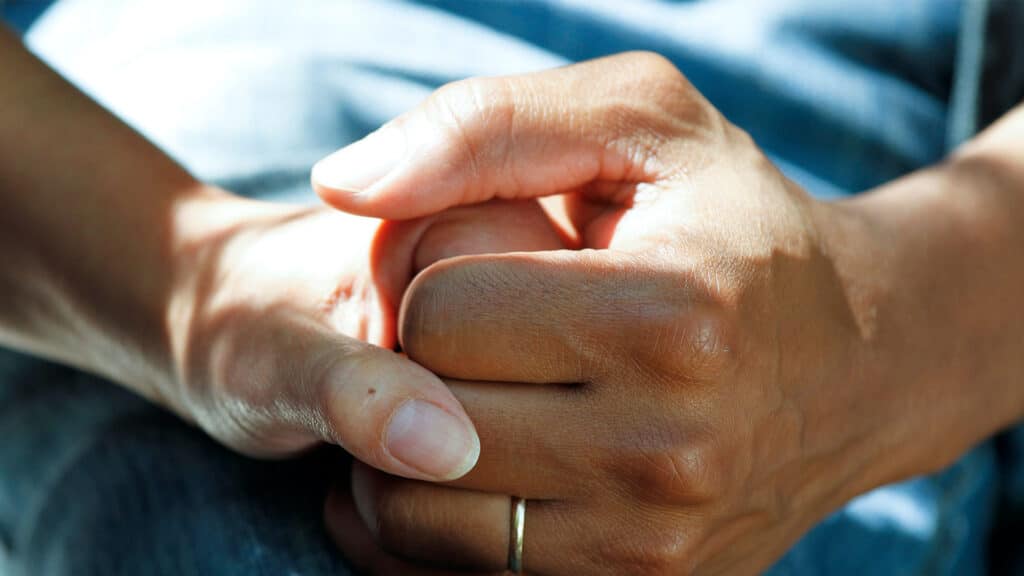 holding hands at the hospital