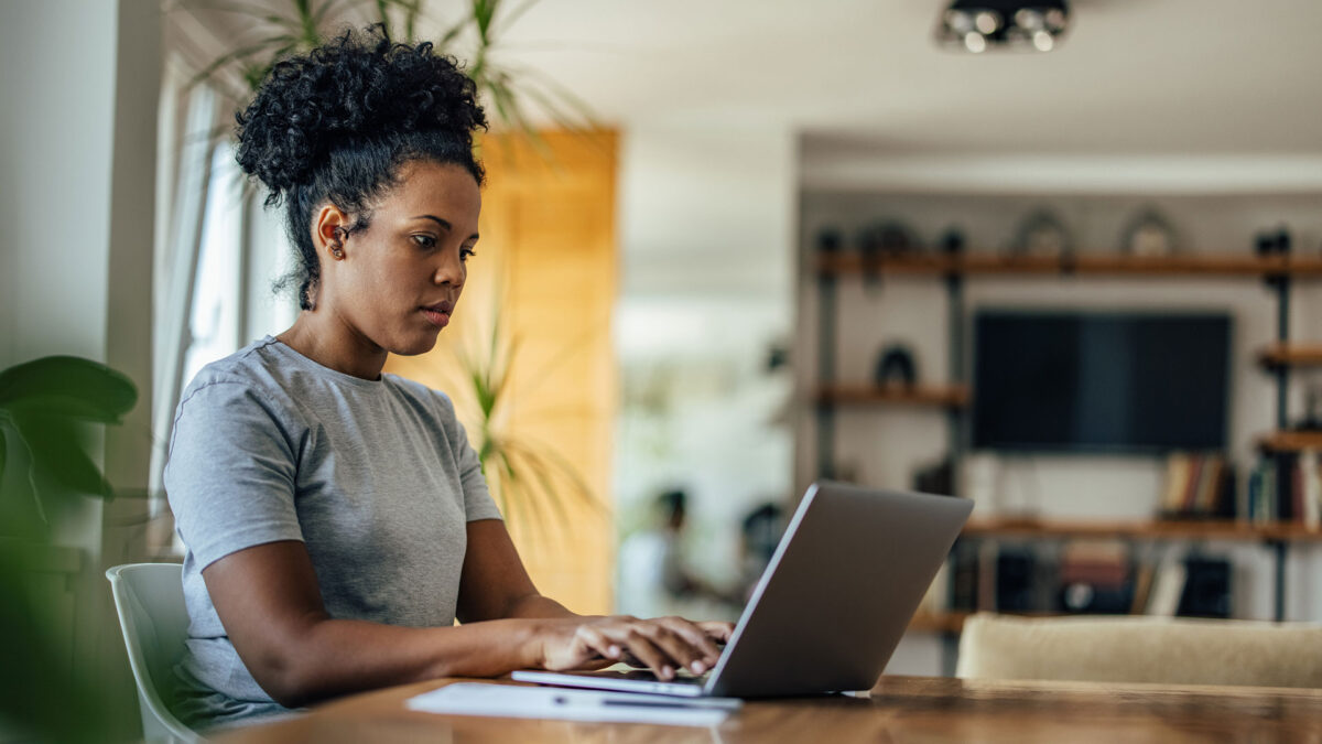 woman at home on computer