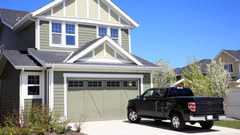 house with truck parked in driveway