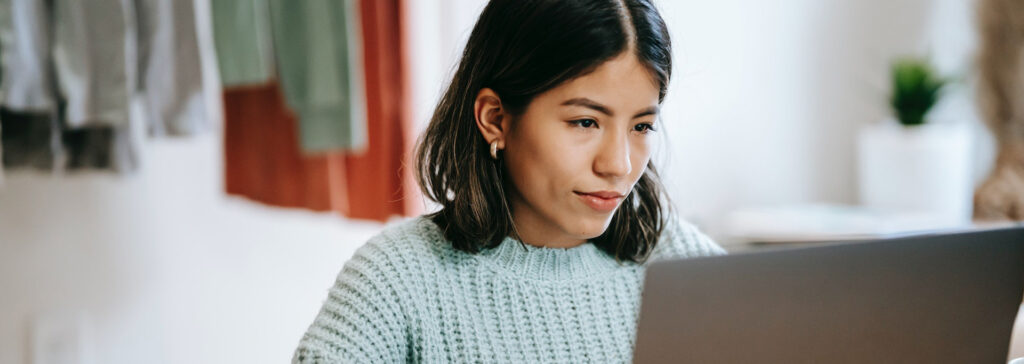 woman on computer at home