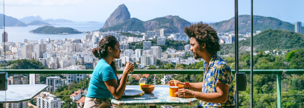 couple on vacation eating outside