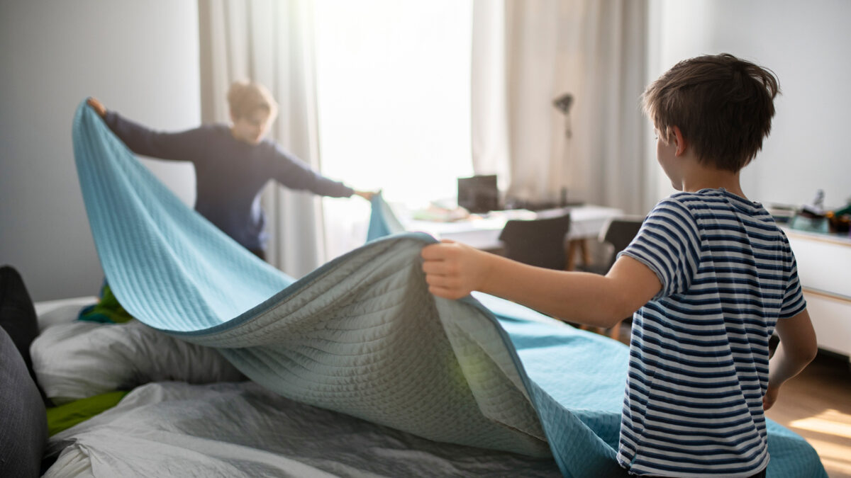 child making bed