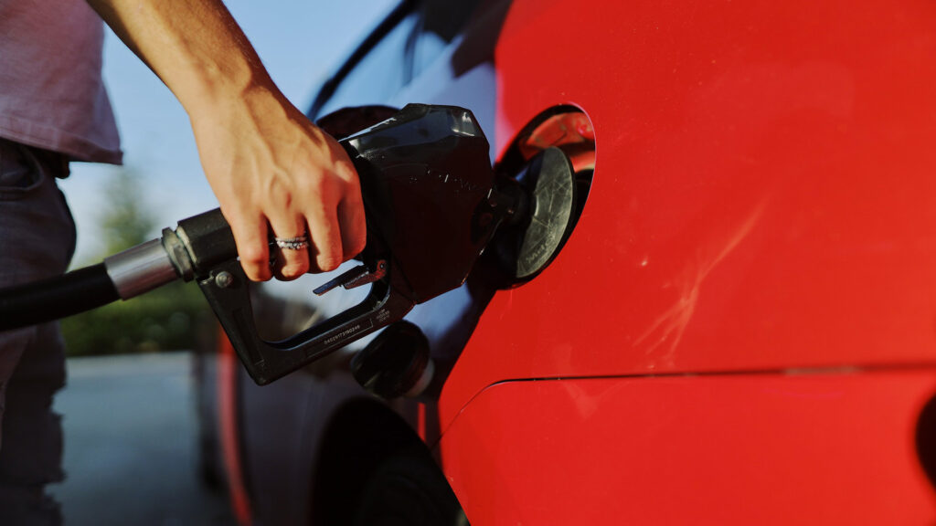 hand pumping gas